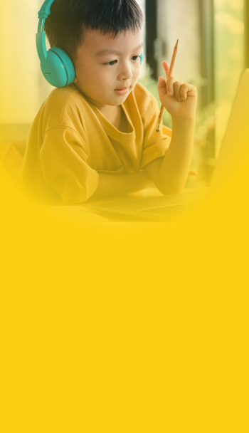 Early childhood student learns at home during live, virtual math tutoring session.